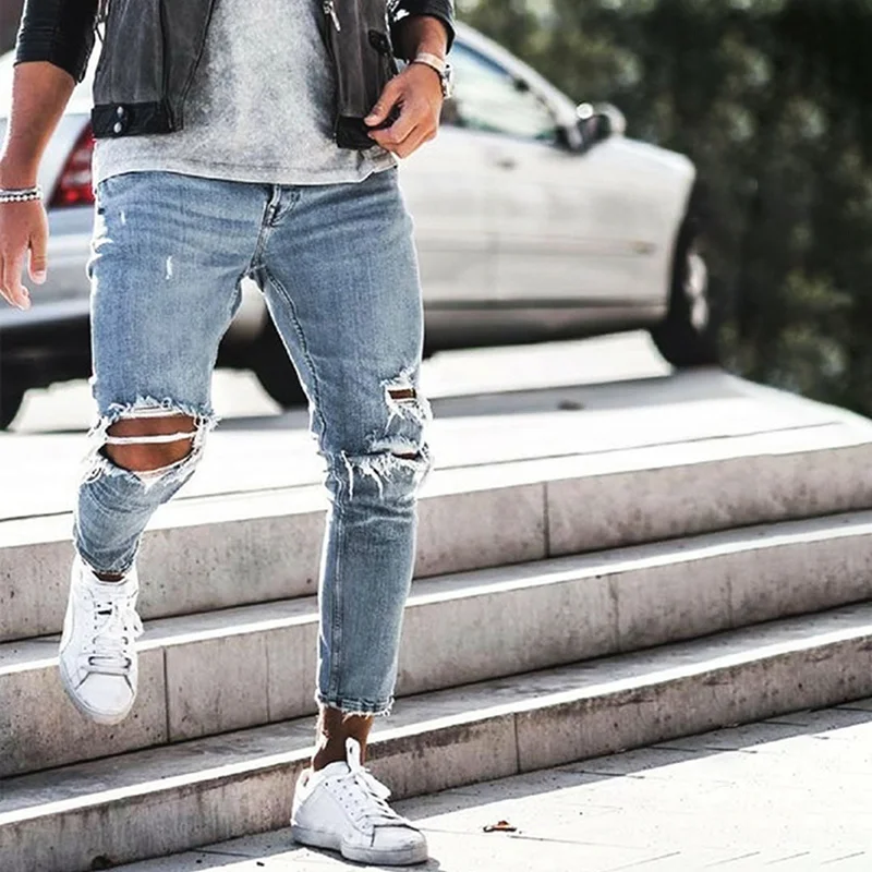 Street fashion ripped men's jeans