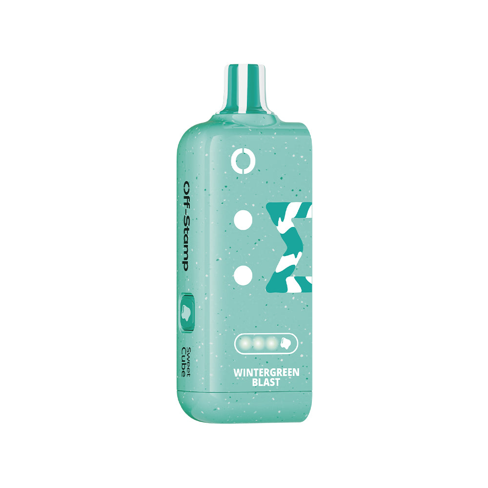 Off Stamp X-Cube Sweet Cube device, Wintergreen Blast flavor, speckled mint green.