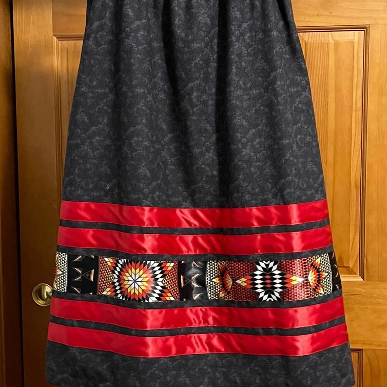 Ribbon Skirt: Chic skirt adorned with ribbons.