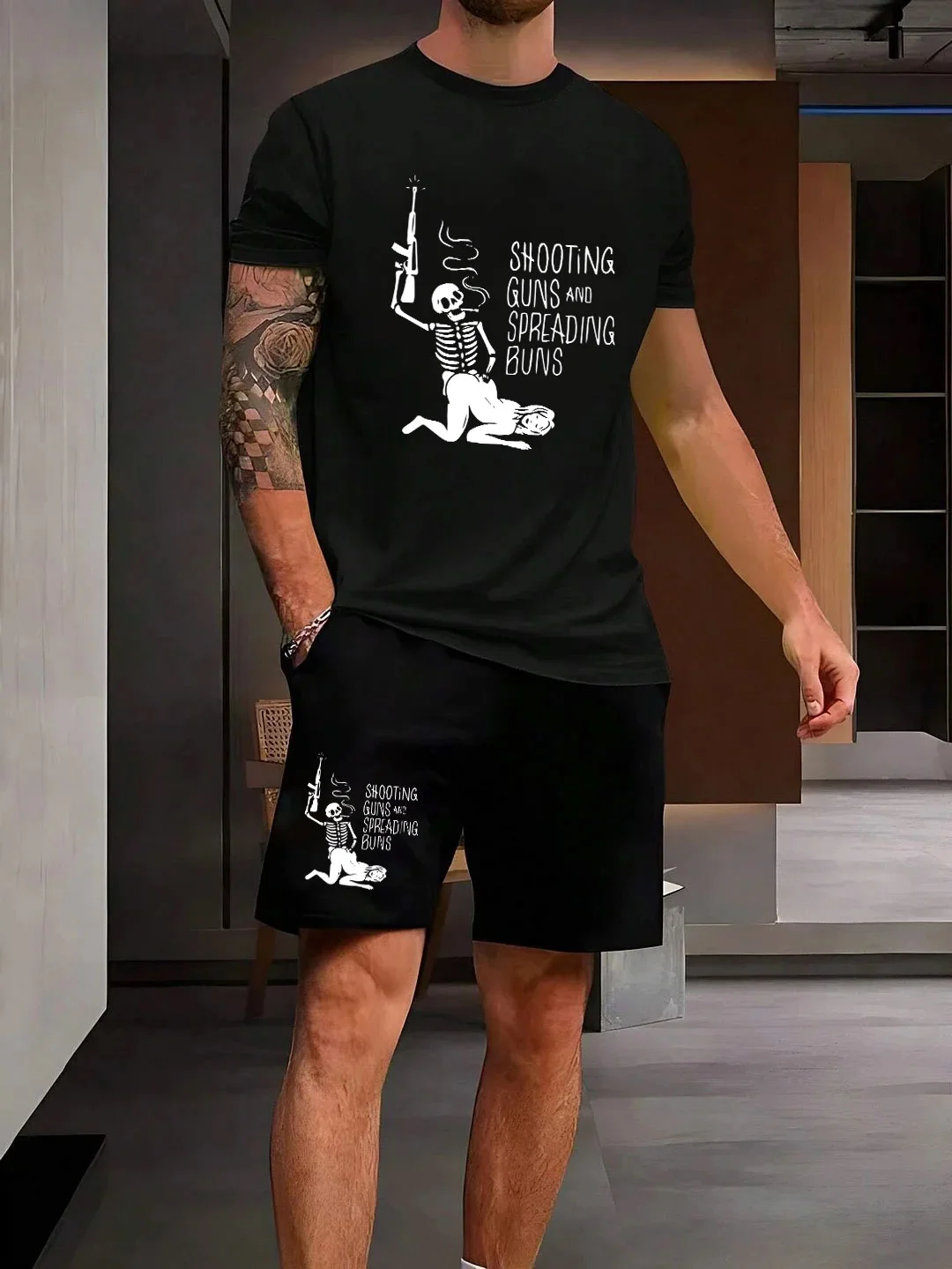SHOOTING GUNS AND SPREADING BUNS Black T-shirt and Shorts Printed Suit