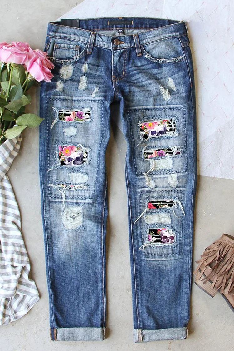 SKULL FLORAL RIPPED JEANS