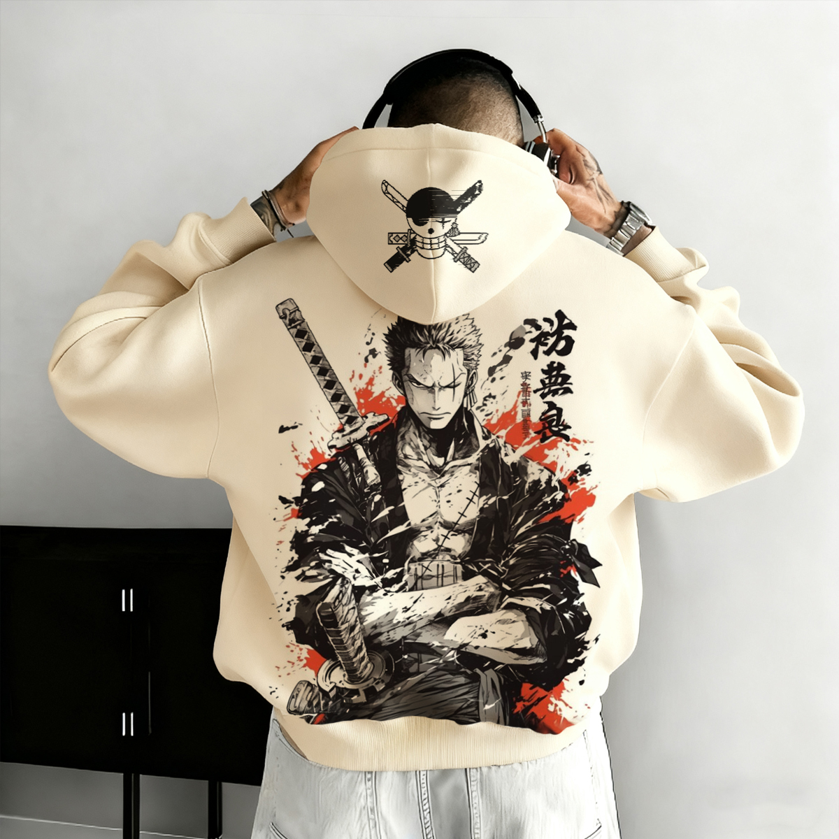 Anime-Inspired Hoodie with Bold Back Print and Skull Logo Design