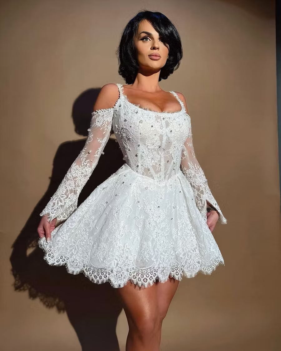 Lussooy Stunning White Lace Off the Shoulder Beaded Long Sleeves A Line Short Prom Dress