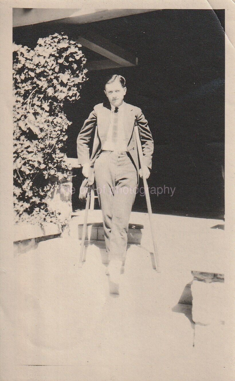 MAN ON CRUTCHES Found Photo Poster painting BLACK + WHITEORIGINAL DD 811 22 F