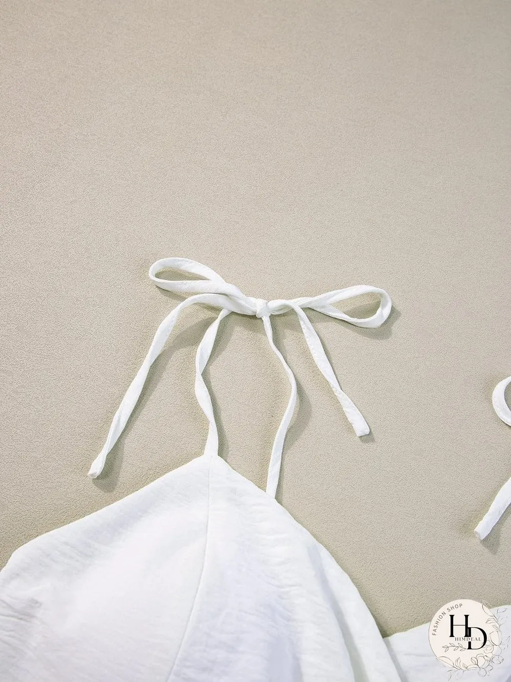 Elegant Beige Pleated Wide Leg Jumpsuit with Spaghetti Straps