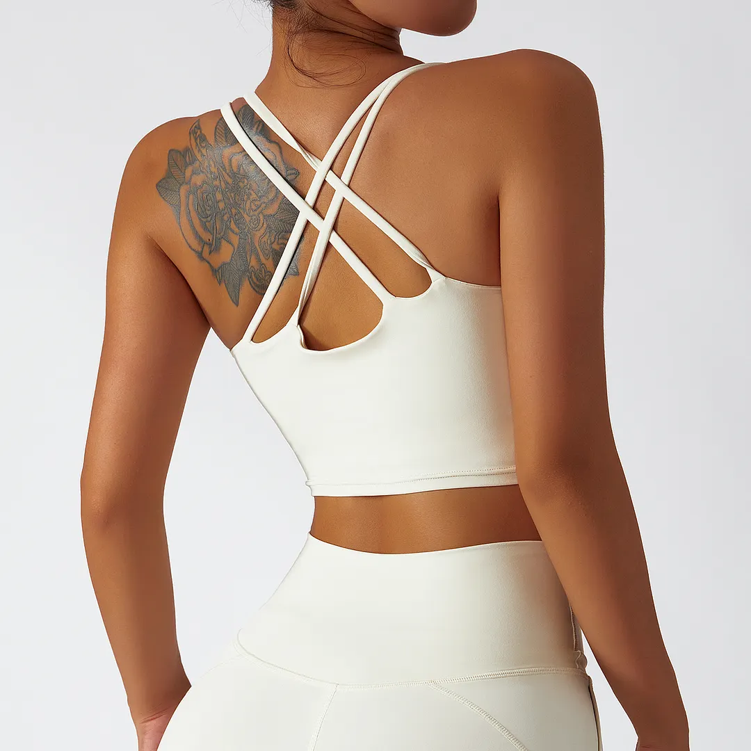 Buy Hergymclothing Cream Apricot sustainable recycled material criss cross thin straps breathable sports bra at an affordable price