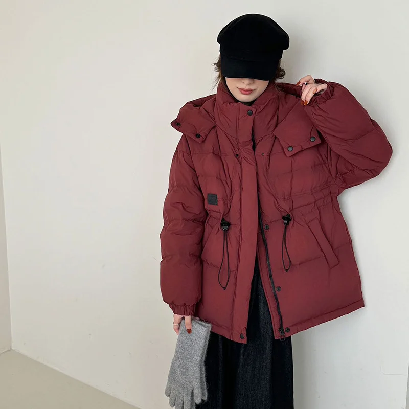 Toloer Outdoor Cold Resistant White Duck Velvet Overalls Down Jacket Female 2024 New Fashion Hooded Leather Logo Waist Show Thin Coat-Outfit Ideas