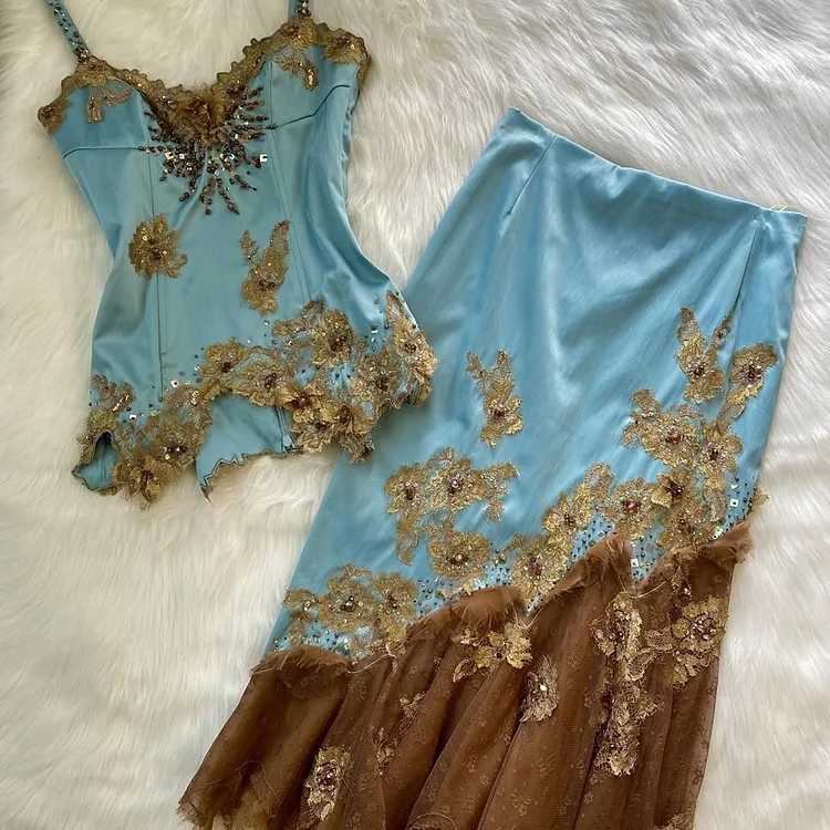Blue floral beaded and gold appliqu&eacute; twopiece suits, ball gowns, evening gowns, party dresses