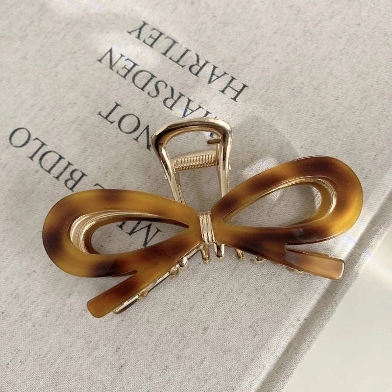 Women’s Classic Style Bow Knot Acetic Acid Sheets Metal Criss Cross Hair Claws