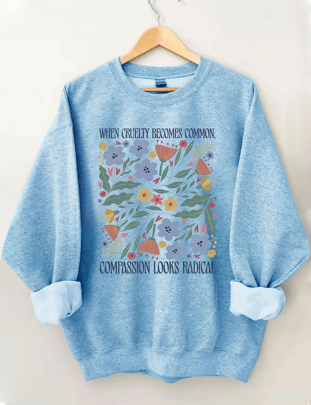 When Cruelty Becomes Common Compassion Looks Radical Sweatshirt