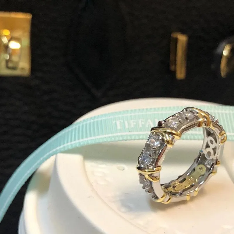 Schlumberger ring Crossed XO diamond ring