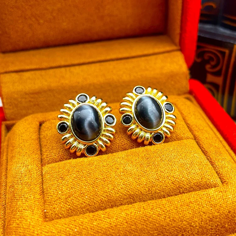 Elliptical cat's eye stone earrings