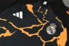 Real Madrid 25-26 1/4 Zip Tracksuit Black & Orange Camouflage Style Chandal