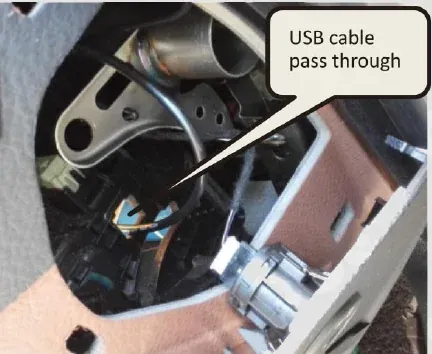 USB extension cable fed into the BMW F10 dashboard storage compartment