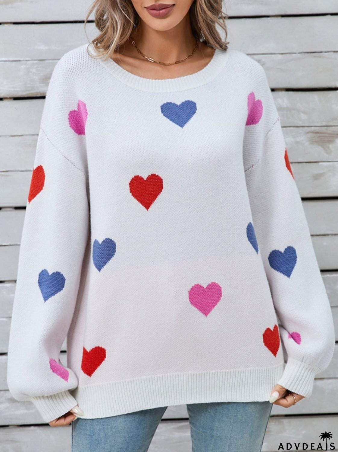 Heart-shaped, long-sleeved crew neck sweater