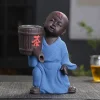 Purple sand tea pet ornaments, little monk tea set leak detection accessories, can raise urine children, tea filter, water filter, fortune-bringing Maitreya Buddha tea pet