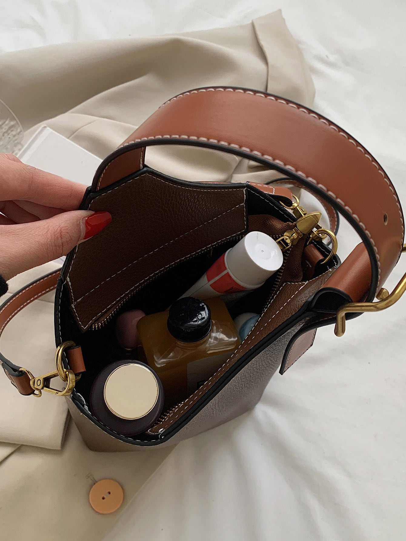 Mini pebbled embossed bucket bag