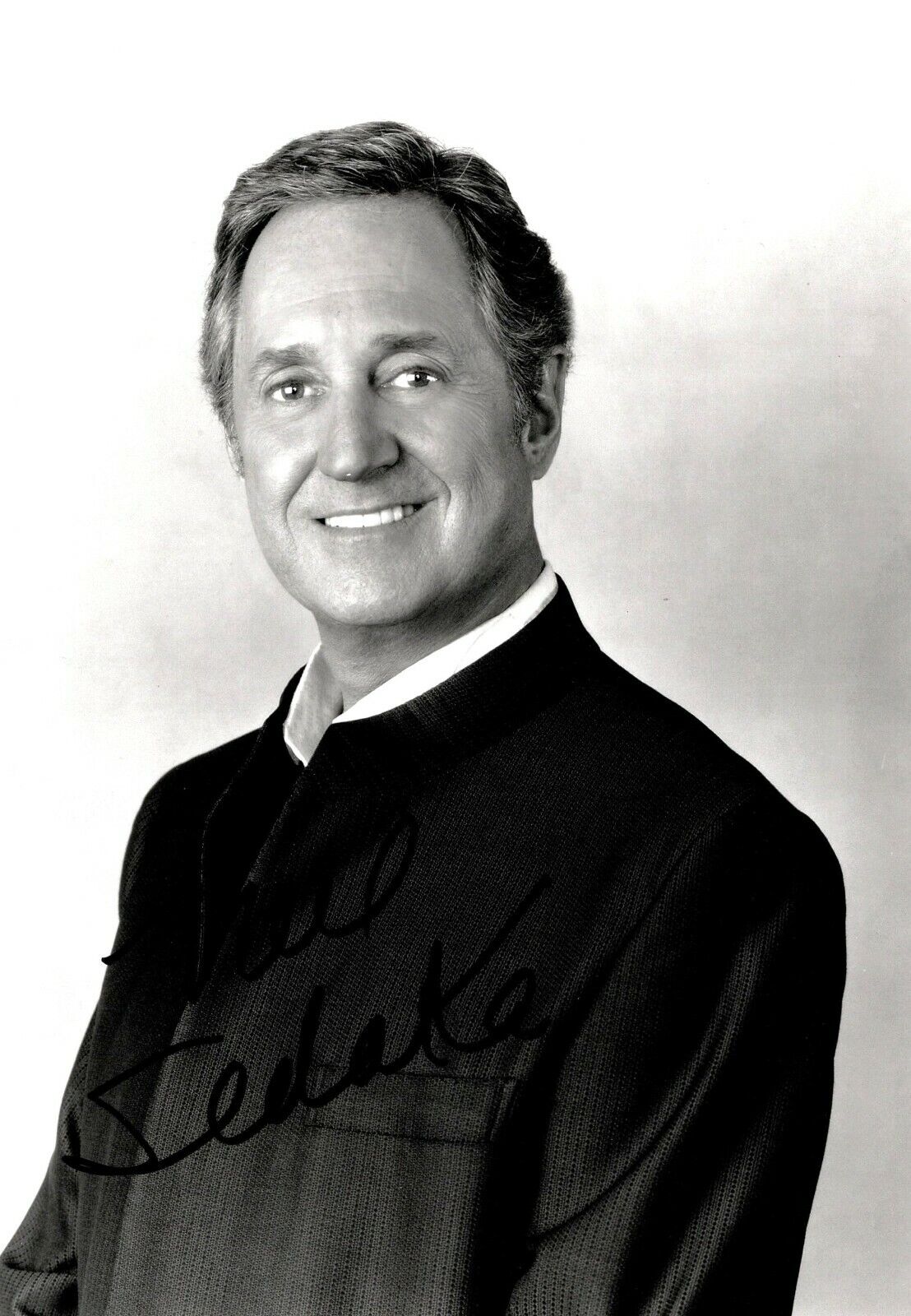 AUTOGRAPHED 8X10 SIGNED BY 60'S/70'S SINGER SONG WRITER NEIL SEDAKA UACC COA