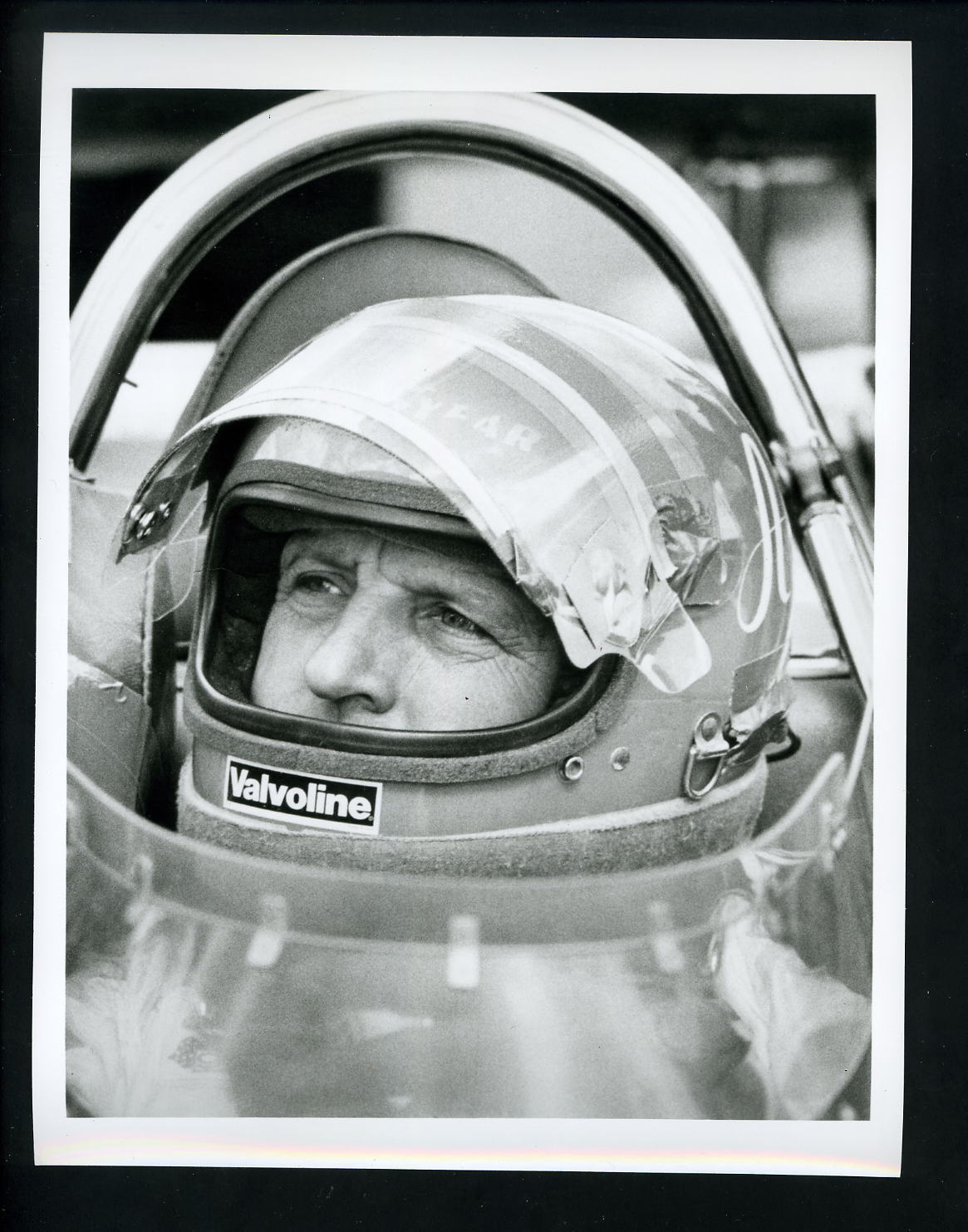 A.J. Foyt wearing helmet in Indy car circa 1970's Press Photo Poster painting