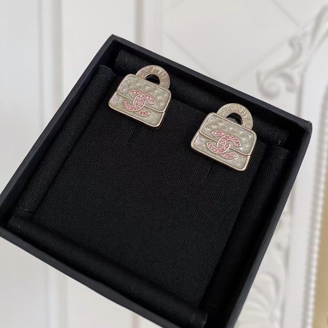 Buy replica Chanel Pink Double C Lock Earrings and replica jewelry from PICKS Jewelry