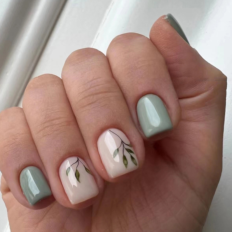 Qinice 24Pcs Simple Blue Fake Nail with Green Leaves Design Short Square Head False Nails Wearable Acrylic Finsied Press on Nails