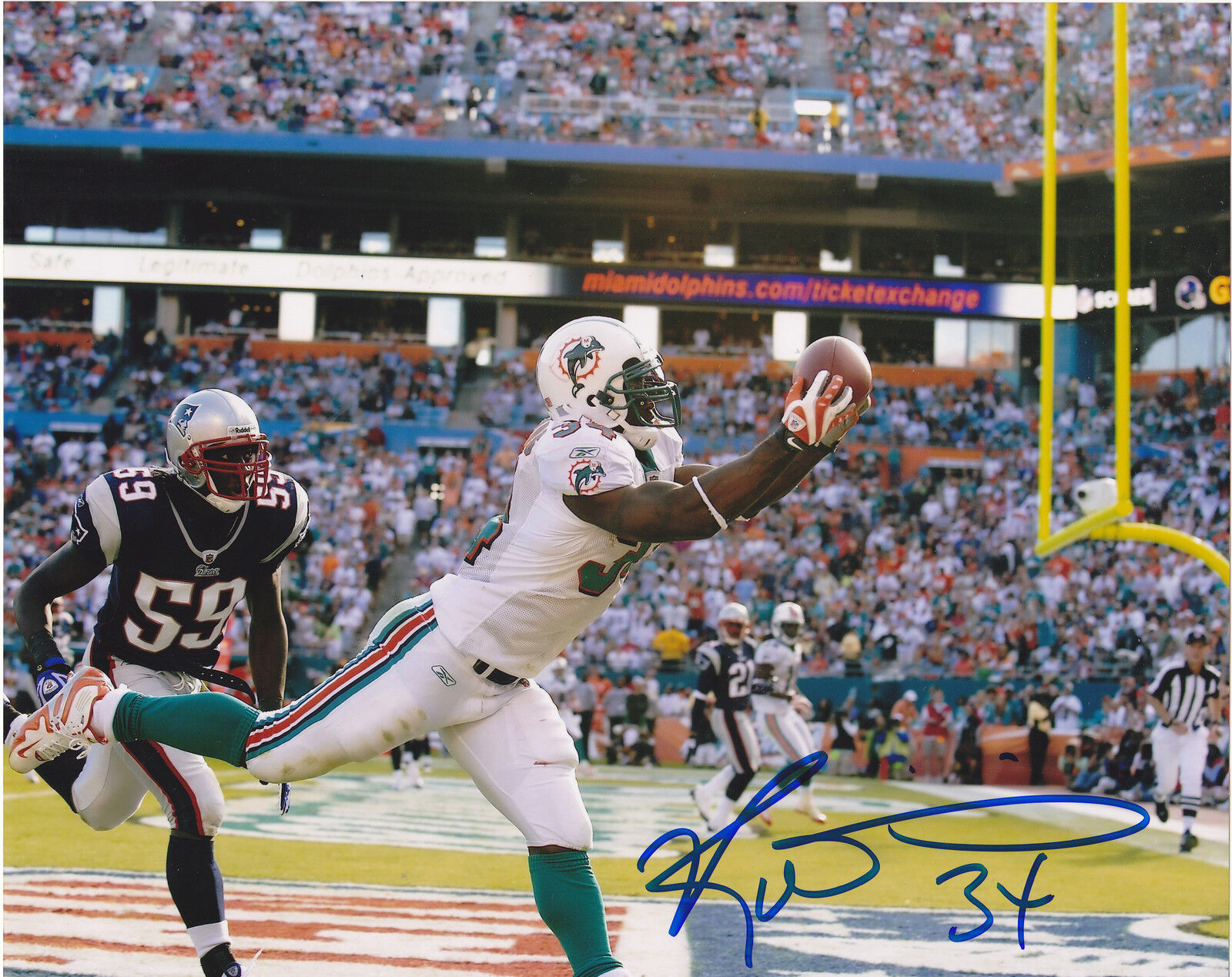 RICKY WILLIAMS MIAMI DOLPHINS ACTION SIGNED 8x10