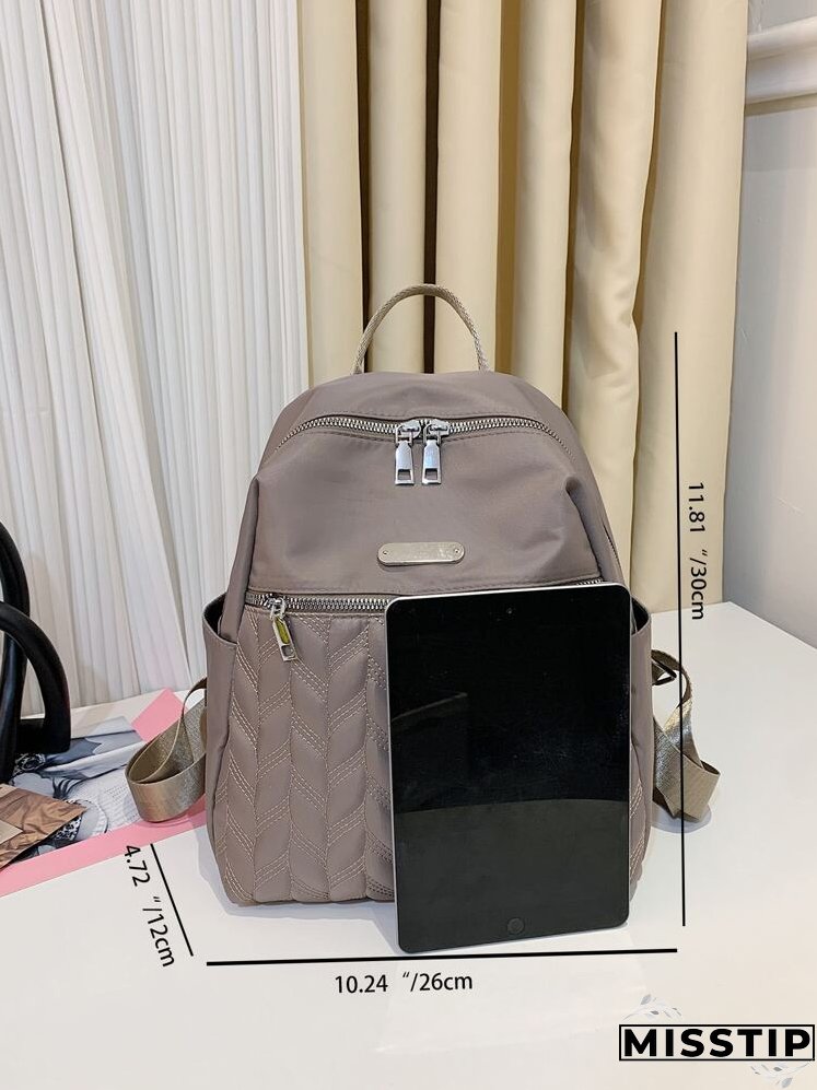 Metal Decor Quilted Backpack