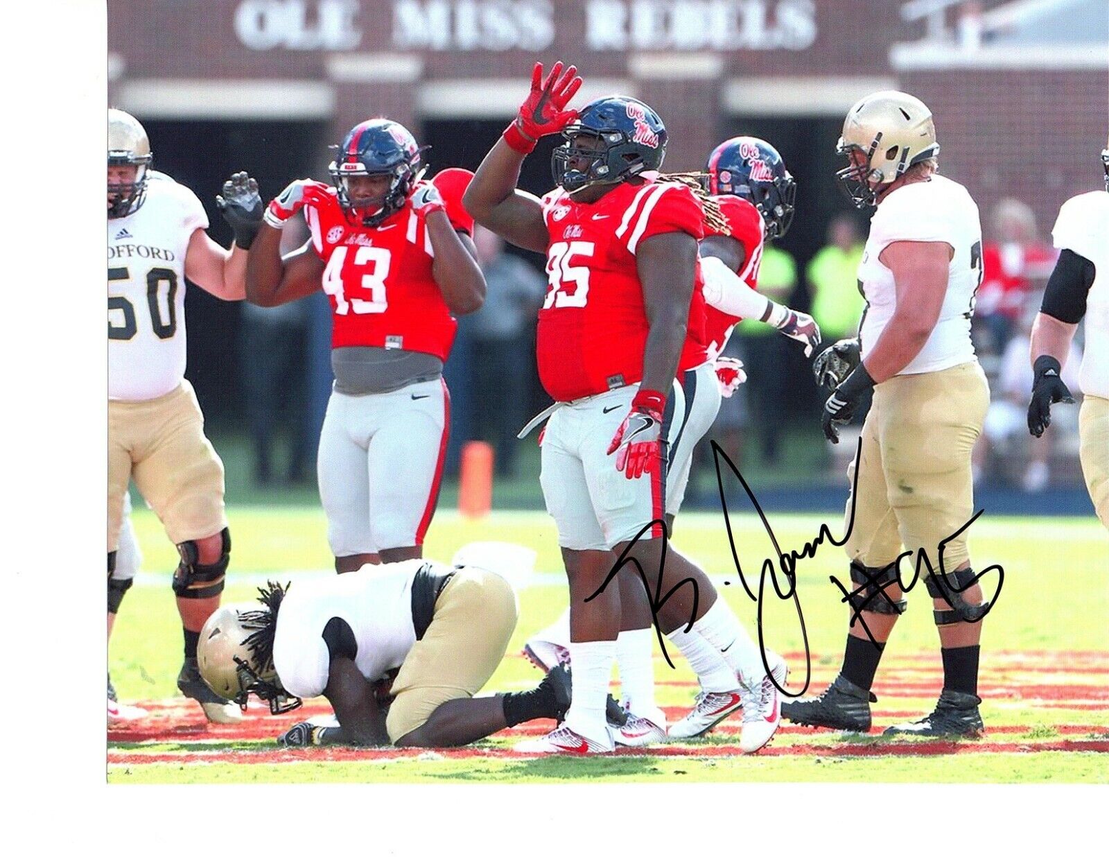 Benito Jones Ole Miss Rebels signed autographed 8x10 football Photo Poster painting Mississippi!