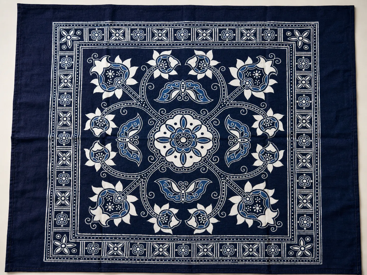 Flower and vine motifs in indigo batik