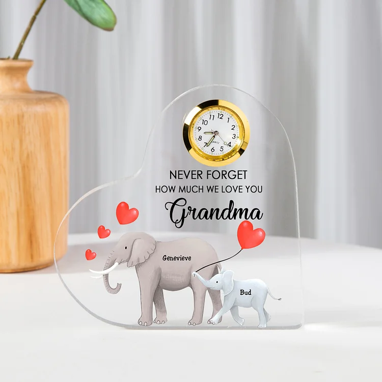 A la familia-Placa acrílica en forma de corazón elefantes con un reloj 1 texto 2 nombres personalizados