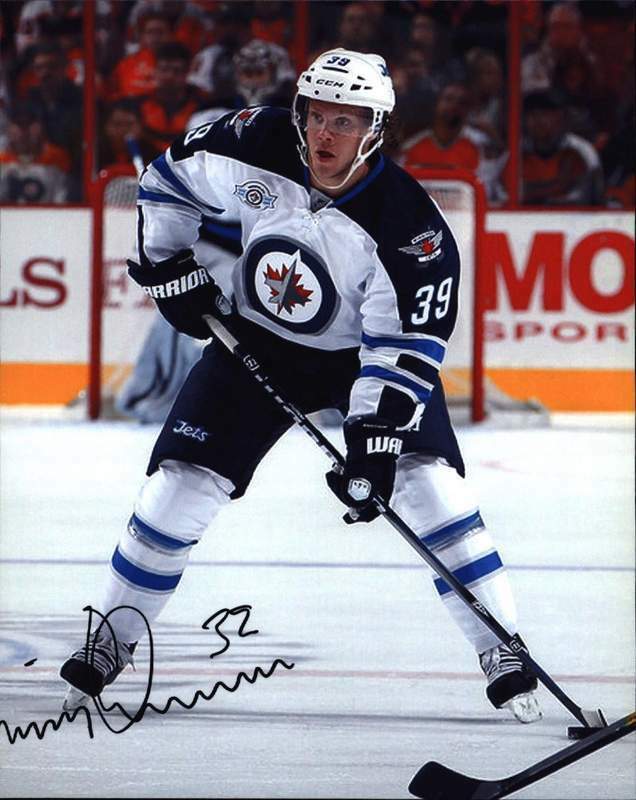 Tobias Enstrom signed NHL hockey 8x10 Photo Poster painting W/Cert Autographed A0001