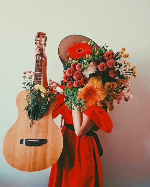 

Woman Holding Flowers And Guitar – Paint By Numbers - 40*50CM, 501 Original