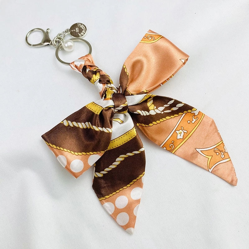 Sweet Minimalist Bow Knot Cloth Metal Unisex Bag Pendant Keychain