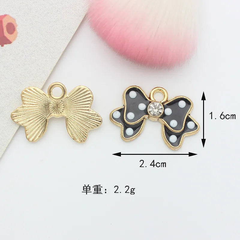 10 PCS/Package 1.5 * 20mm 14 * 14mm 7 * 12mm Alloy Rhinestones Pearl Number Heart Shape Bow Knot Polished Pendant