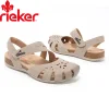 A nova sand&aacute;lia de mulher Rieker&reg; em pele de bezerro &eacute; confort&aacute;vel e possui um suporte curvo, perfeita para uso no exterior