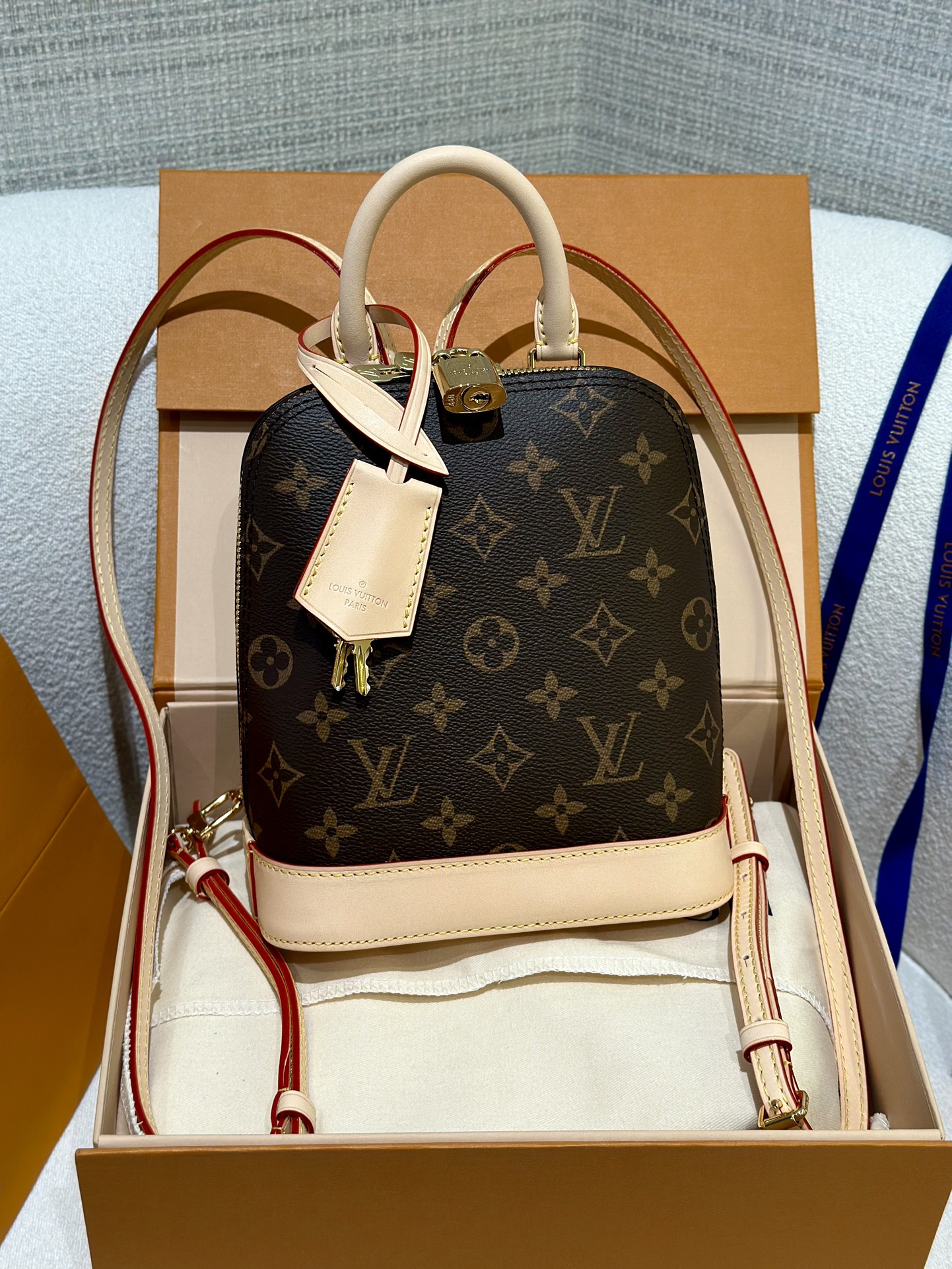Lv Mini Alma Backpack