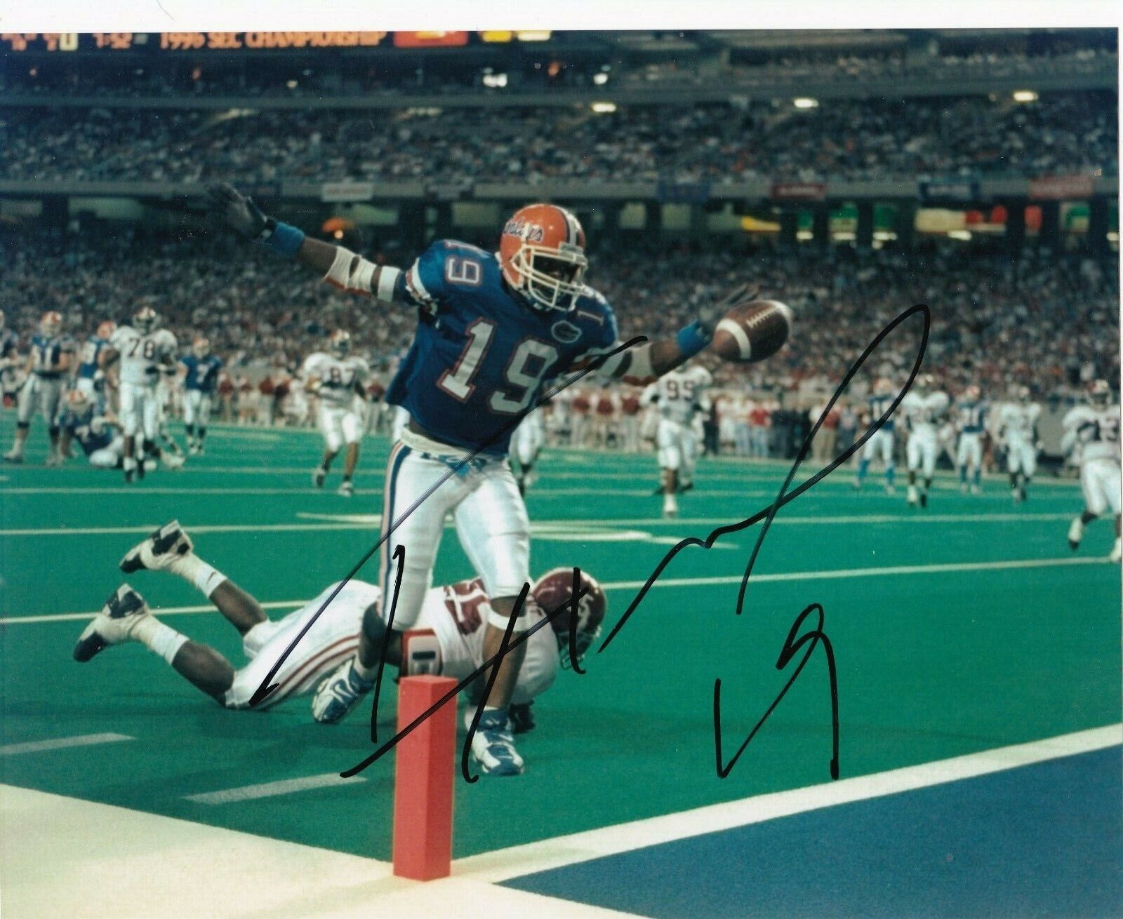 IKE HILLIARD FLORIDA GATORS ACTION SIGNED 8X10