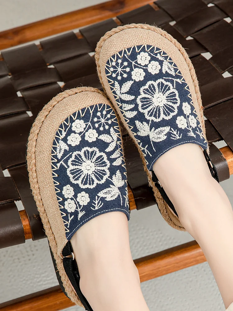 Women's linen sandals with ethnic floral embroidery.
