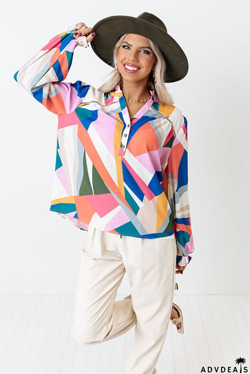 Geometric Patchwork Print Half Buttoned Blouse