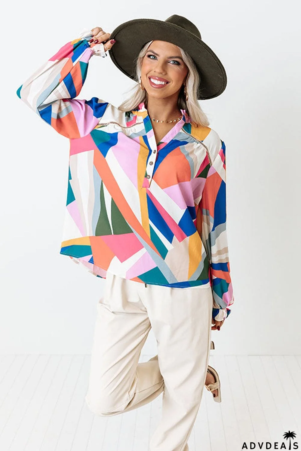 Geometric Patchwork Print Half Buttoned Blouse