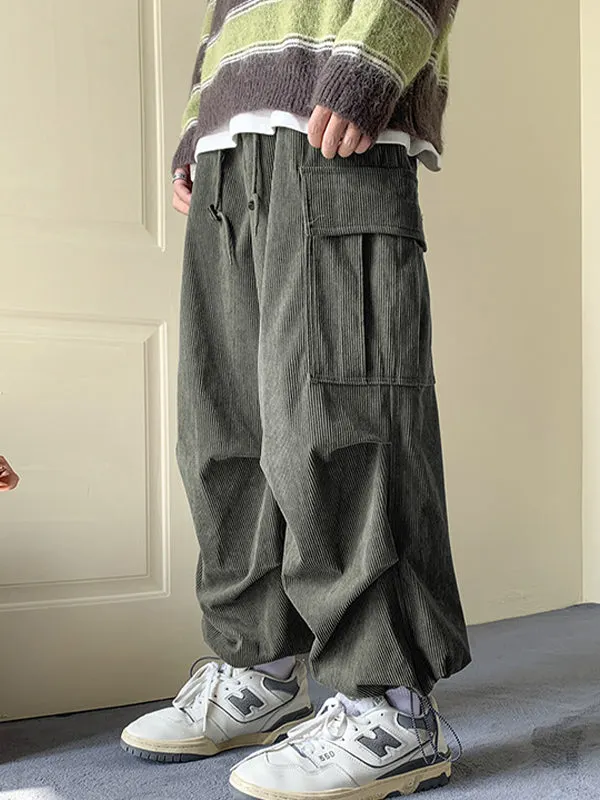 Brownm vintage men's corduroy trousers with large pockets and drawstring