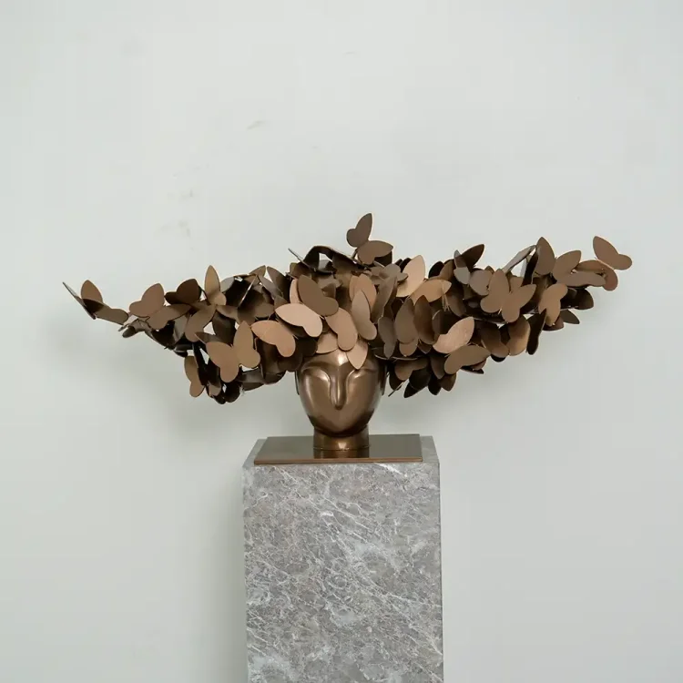 Metal butterfly head sculpture