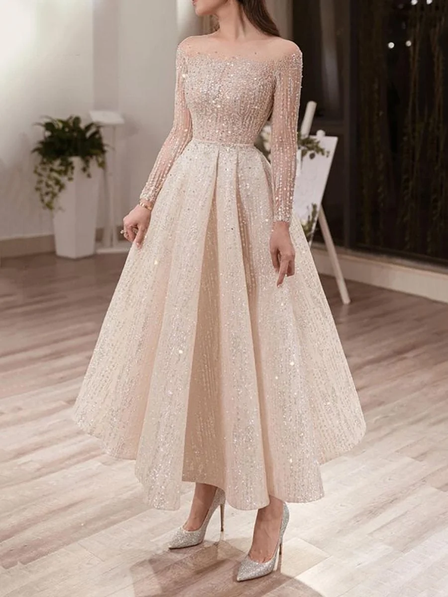 Midi sequined dress with round neck and long sleeves