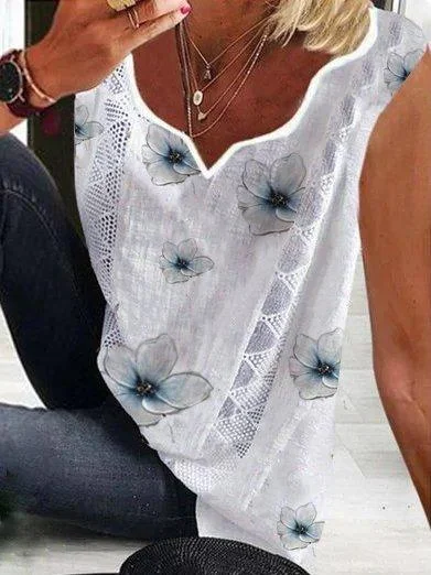 A sleeveless blouse with a floral design