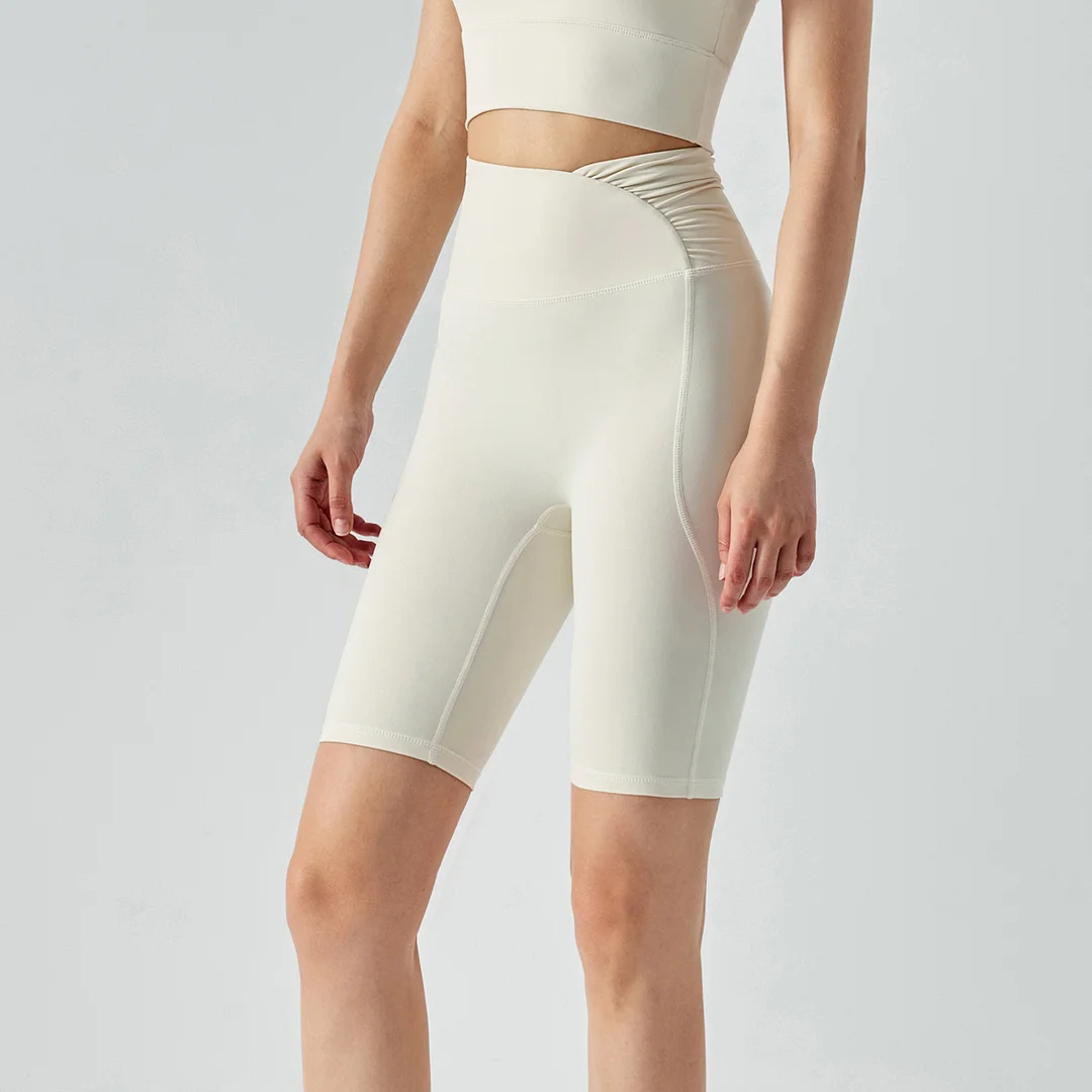 Hergymclothing Ivory White women's sustainable environmentally friendly ruched waist dri-fit butt lifting tummy control yoga legging shorts for sale