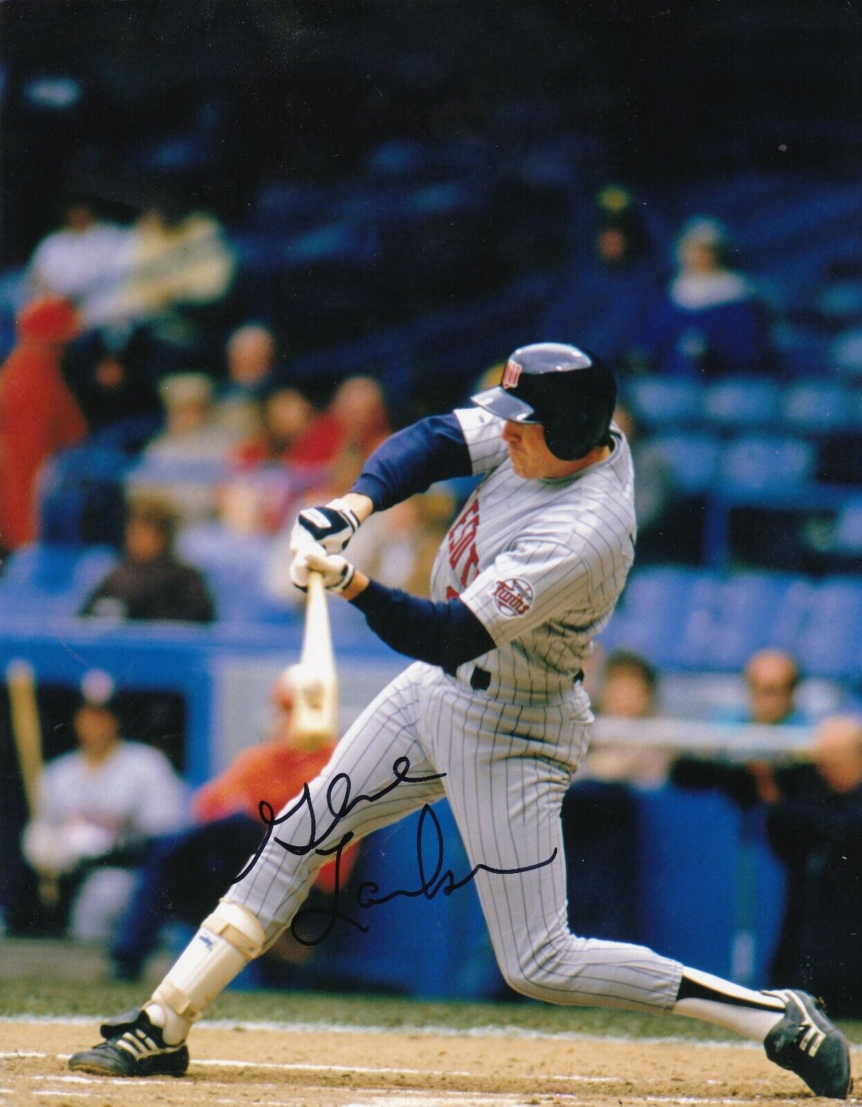 GENE LARKIN MINNESOTA TWINS ACTION SIGNED 8x10