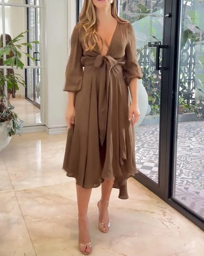 A-line dress with deep V neck and high waist