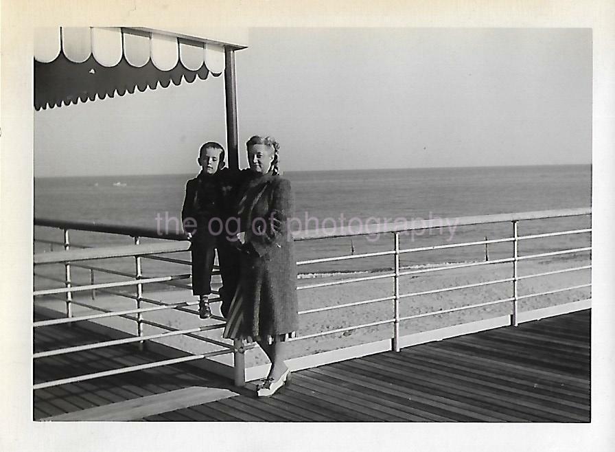 1940's Boy FOUND Photo Poster painting bw AT THE BEACH WITH GRANDMA Original Snapshot 19 7 M