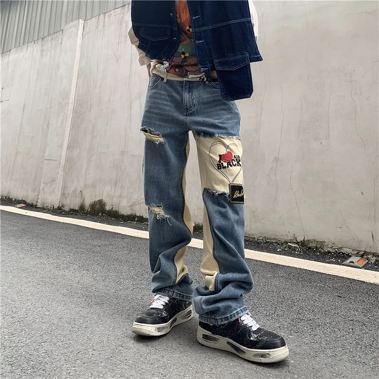 Men's Streetwear Hip Hop Irregular Design Ripped Jeans at Hiphopee