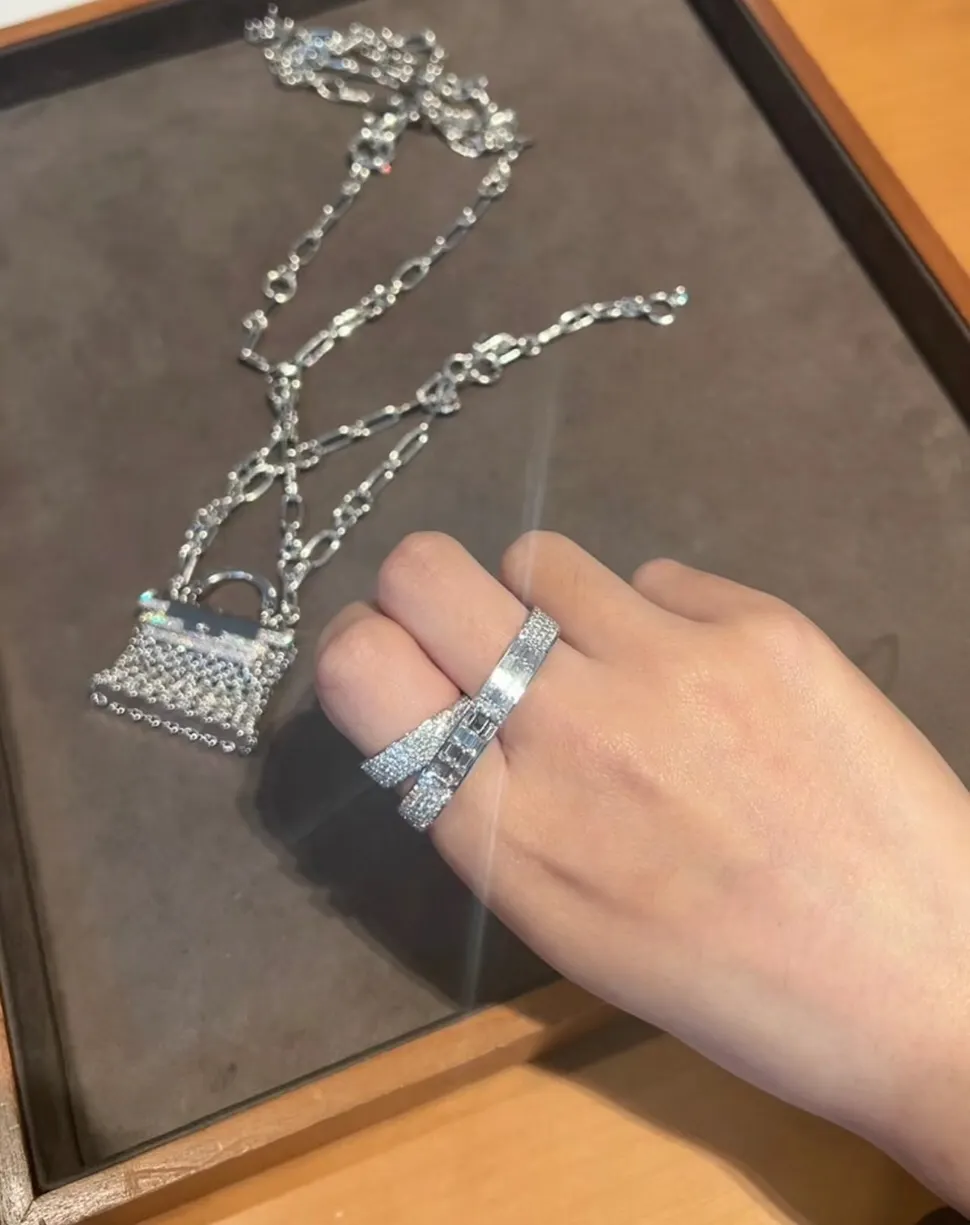 kellymorphose rhinestone double ring in white and gold